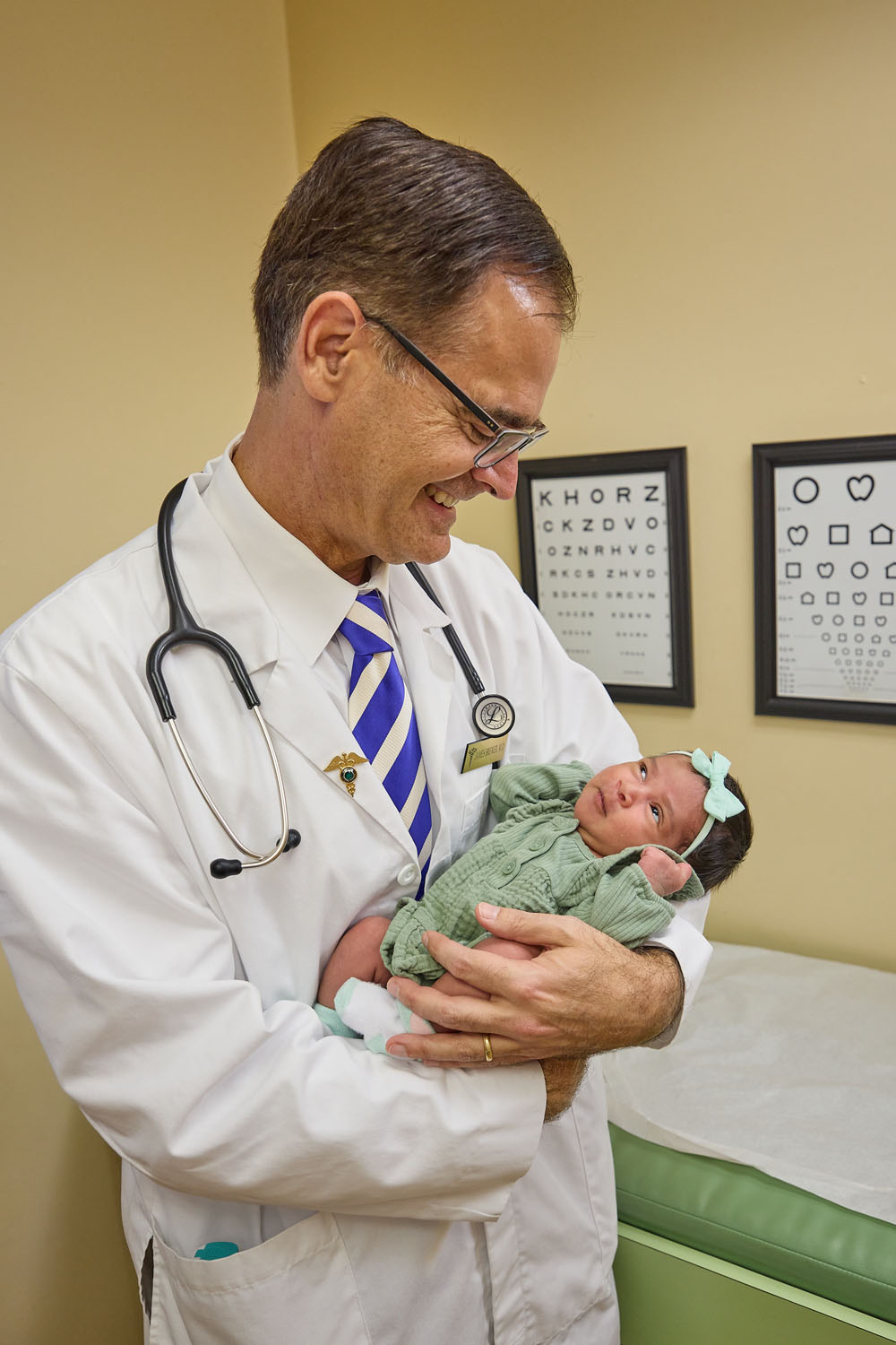 Dr James Brewer with tiny new patient